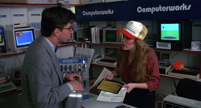 Miles and Madeline in a computer shop